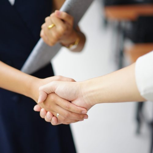 businesswoman-handshake-with-partner-vendor